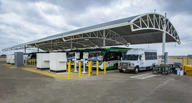 Buses charging at a charging station
