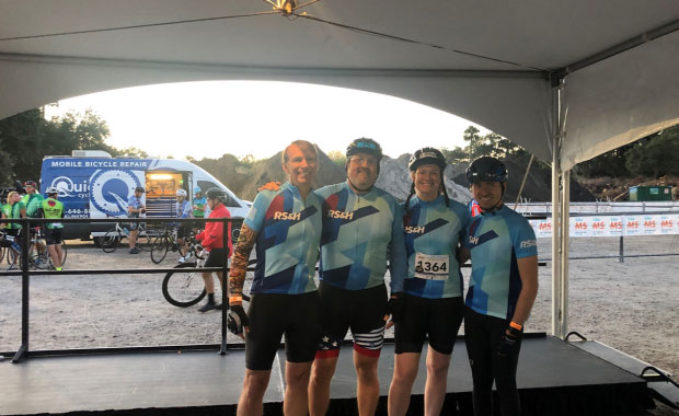 Group of people in biking gear. 