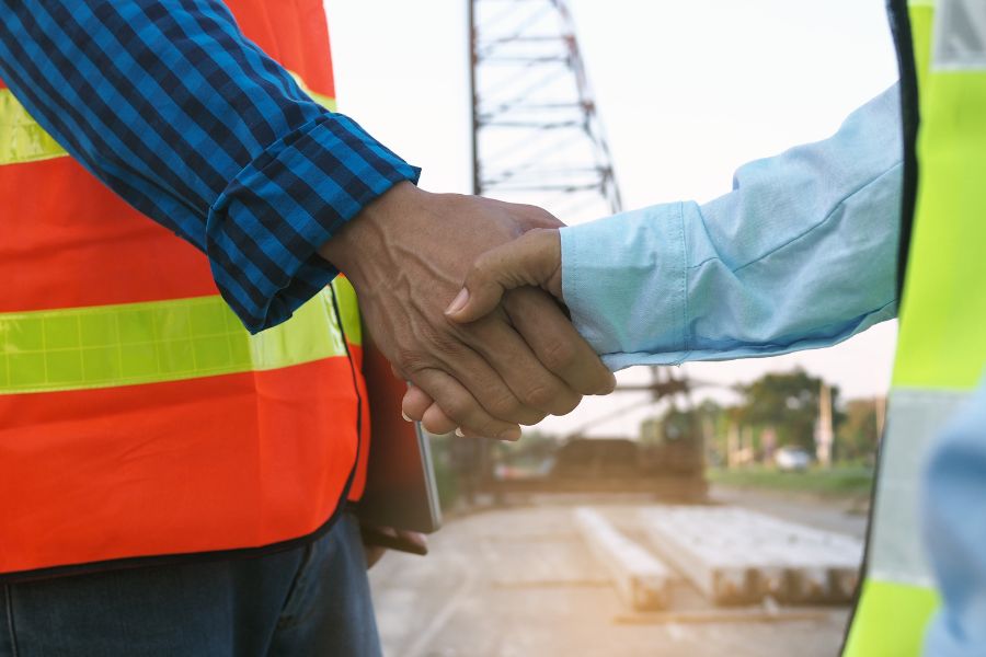 Two people shaking hands.