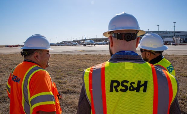 3 men on runway