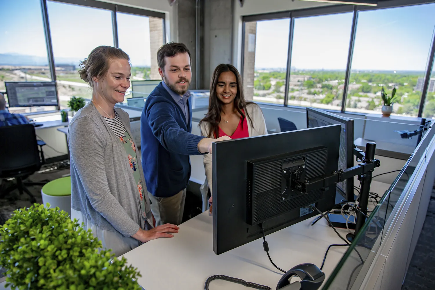 Associates working together in Denver office.