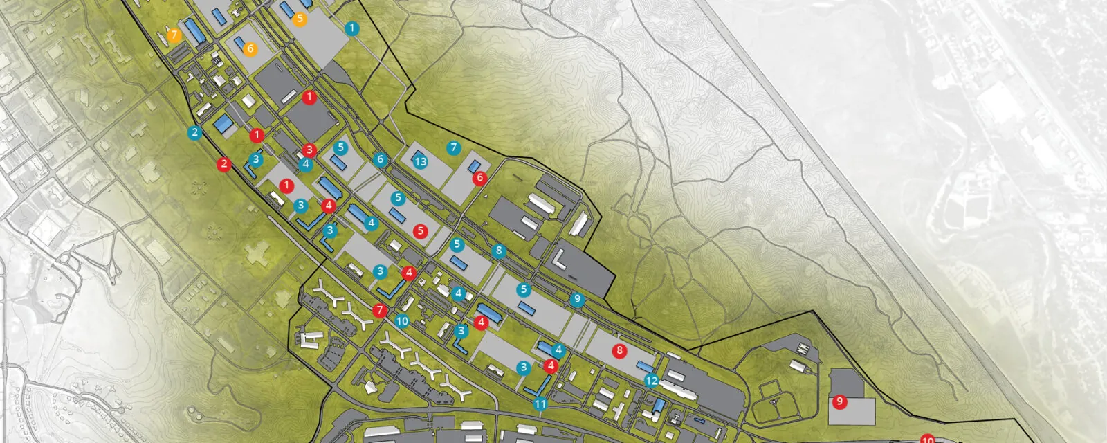 Map with numbered locations, roads, and buildings, displaying a colored layout of a site plan.