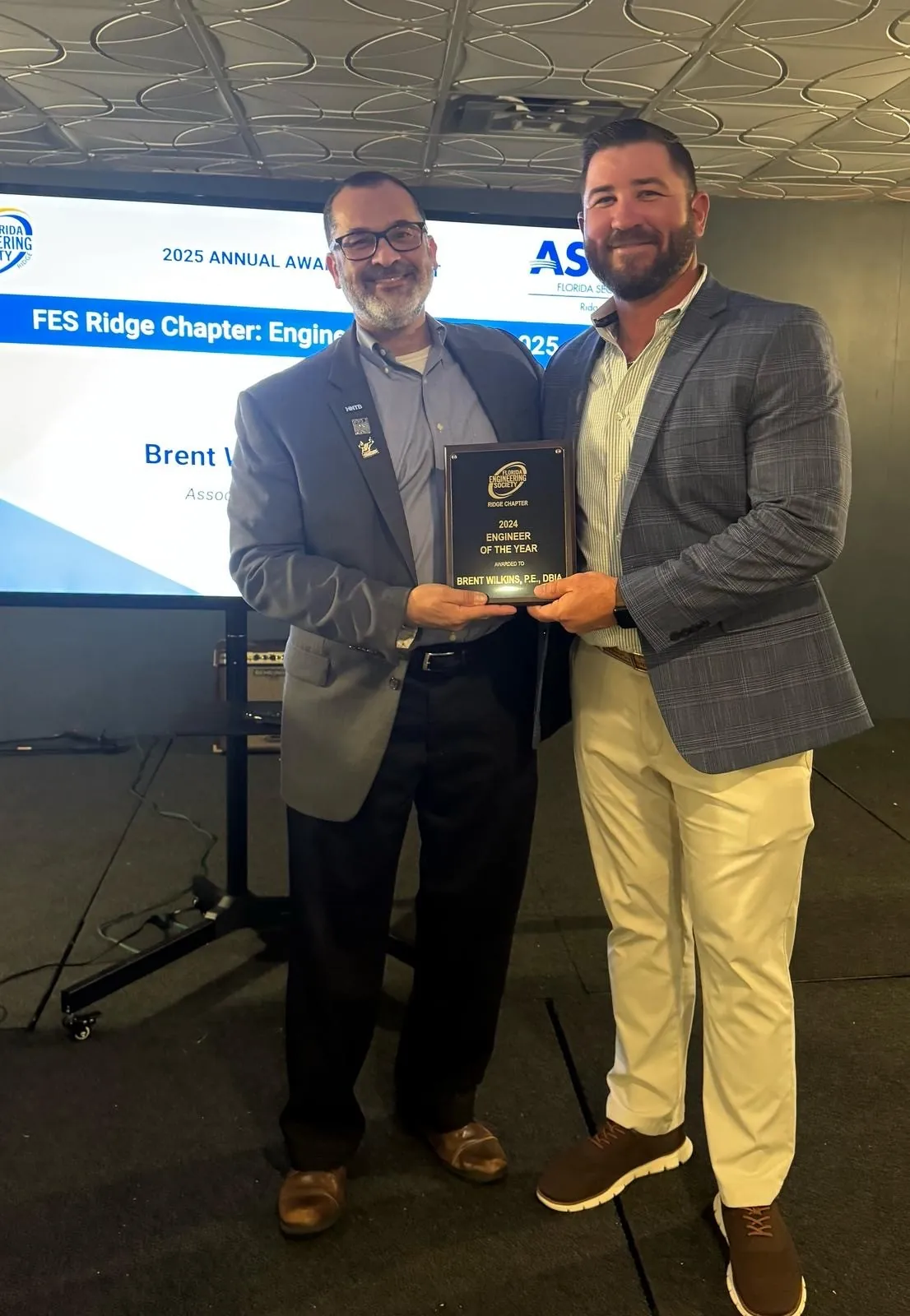 Brent Wilkins receiving Engineer of the Year award.