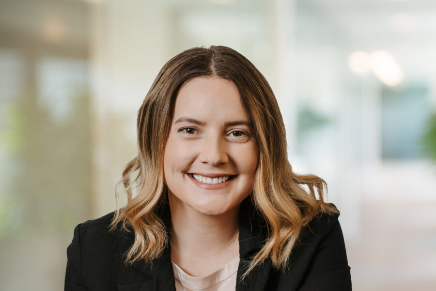 Tara Pence smiling in a professional setting