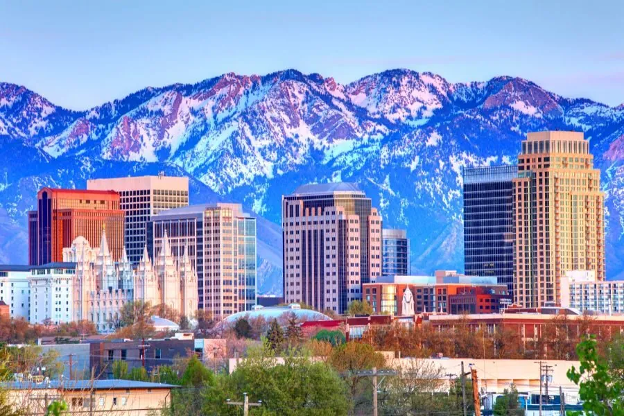 Salt Lake City skyline with snow-capped mountains in the background
