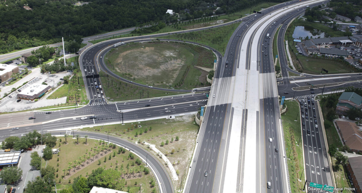 Aerial view of I-4 highway interchange with multiple lanes and surrounding greenery